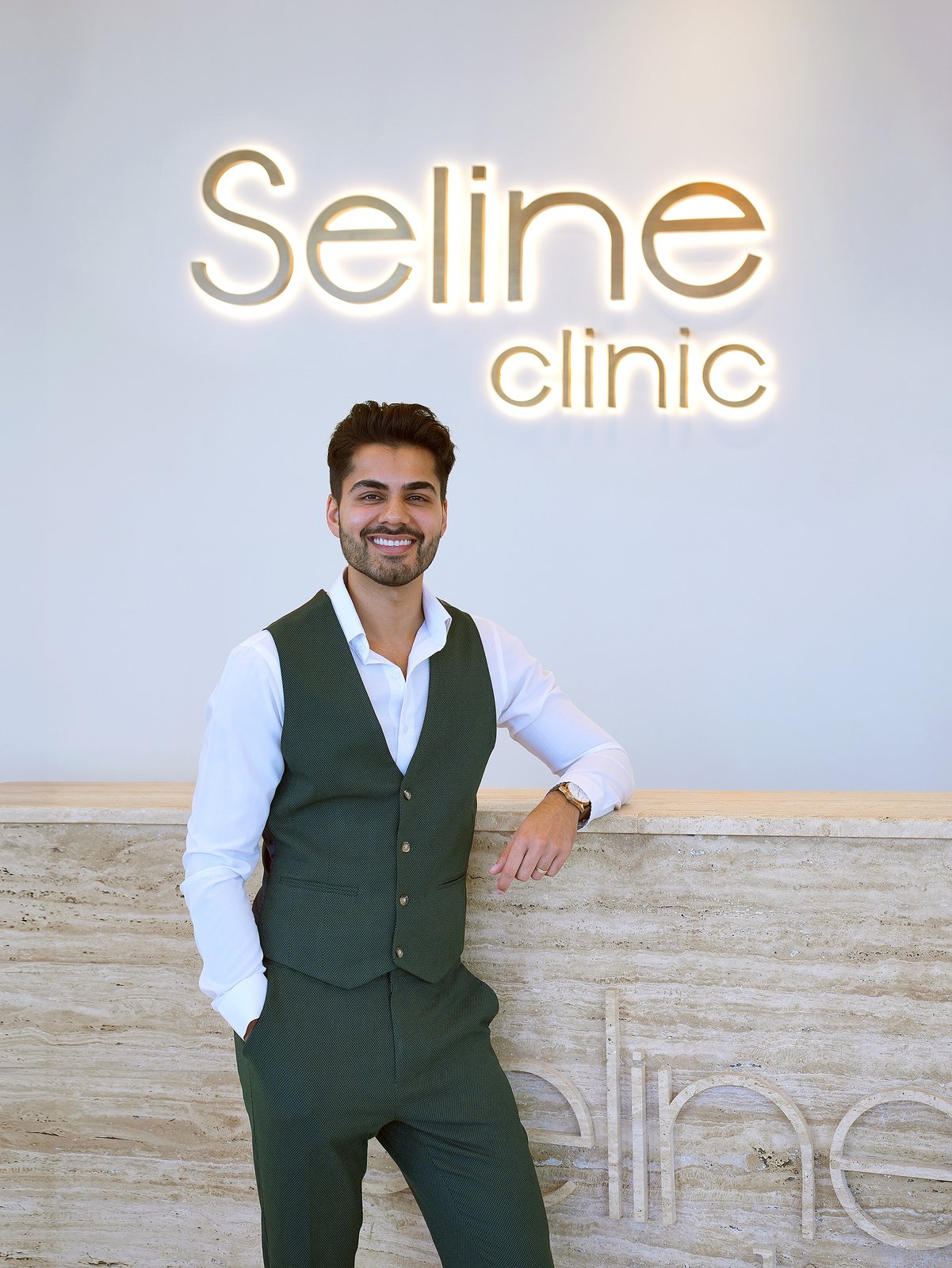 Dr Rosh Roddha at Seline Clinic reception, Dubai